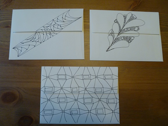 Backs of envelopes decorated with Zentangles